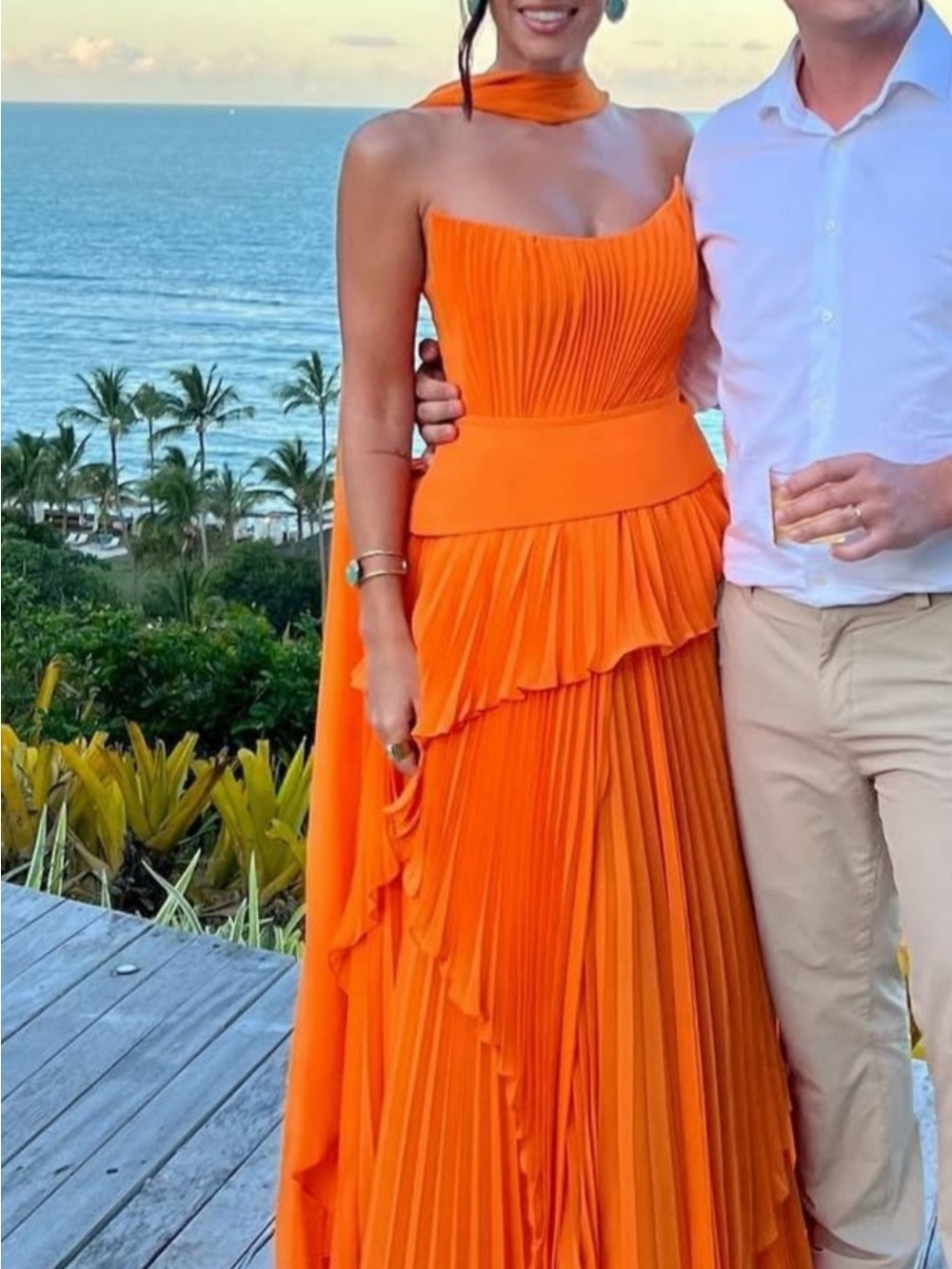 Elegant Orange Pleated Maxi Dress with Cape Accent